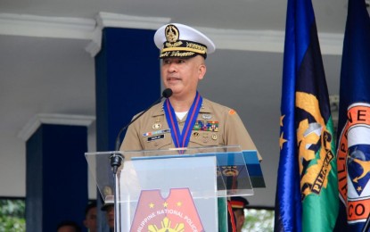 <p><strong>READY FOR POLLS.</strong> AFP deputy chief of staff Lt. Gen. Charlton Sean Gaerlan, delivers AFP chief Gen. Romeo Brawner Jr.'s message during the simultaneous multi-agency send-off and turnover ceremony of government forces for BSKE duty on Monday (Oct. 23, 2023) in Camp Crame, Quezon City. Brawner also urged task force members to leave behind political affiliations and personal interests as they aim to create an environment where every Filipino can exercise their right to vote without fear and restriction.<em> (Photo courtesy of the AFP)</em></p>