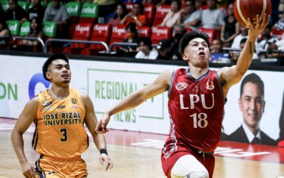 <p><strong>TOP SCORER.</strong> Lyceum's Vince Cunanan scores an easy layup during their game against Jose Rizal University in the National Collegiate Athletic Association Season 99 men's basketball at Filoil EcoOil Centre in San Juan City on Tuesday (Oct. 24, 2023). Cunanan scored 20 points as the Pirates won in overtime, 99-96. <em>(NCAA photo)</em></p>