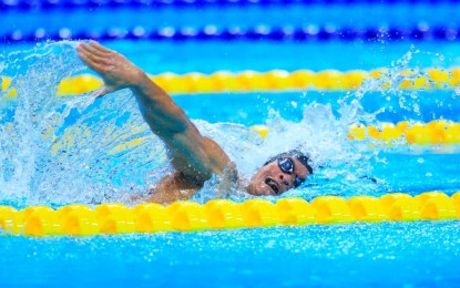 <p><strong>BRONZE FINISH</strong>. Ernie Gawilan splashes his way to a bronze medal in the 4th Hangzhou Asian Para Games swimming meet at the HOC Aquatic Arena on Monday night (Oct. 23, 2023). The Philippines has now two bronze medals, the other courtesy of swimmer Gary Bejino.<em> (PSC media pool photo)</em></p>