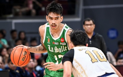 <p><strong>FRONTRUNNER.</strong> La Salle's Kevin Quiambao (No. 17) in action during the University Athletic Association of the Philippines (UAAP) Season 86 men’s basketball tournament. The Season 85 Rookie of the Year is leading the MVP race after the first round with 84.715 statistical points. <em>(UAAP photo)</em></p>