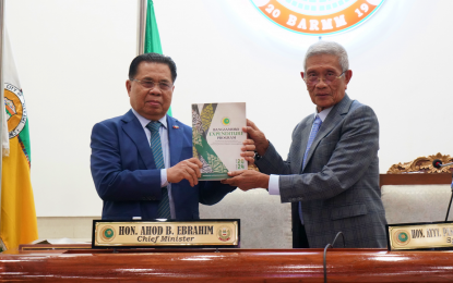 <p><strong>BARMM 2024 BUDGET.</strong> Bangsamoro Autonomous Region in Muslim Mindanao (BARMM) Chief Minister Ahod Balawag Ebrahim (left) presents the 2024 Bangsamoro Expenditure Program (BEP) to Bangsamoro Transition Authority (BTA) Speaker Pangalian Balindong on Tuesday (Oct. 24, 2023) in Cotabato City . The BTA, the region’s provisional lawmaking body, will deliberate on the proposed budget starting next month. <em>(Photo courtesy of BTA-BARMM)</em></p>