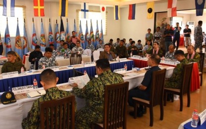 <p><strong>SECURING ELECTIONS</strong>. Officials from the Philippine National Police, Armed Forces of the Philippines, Philippine Coast Guard and Bureau of Fire Protection discuss security measures during the third quarter Visayas Joint Peace and Security Coordinating Center at PCG-Central Visayas headquarters in Cebu City on Tuesday (Oct. 24, 2023). Visayas Command chief, Lt. Gen. Benedict Arevalo, said 17,463 soldiers will secure polling places in the three regions of the Visayas.<em> (Photo courtesy of Viscom PIO)</em></p>
