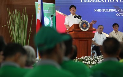 <p><span style="font-family: Roboto, 'Helvetica Neue', Helvetica, Arial, sans-serif;">President Ferdinand R. Marcos Jr. delivers a speech at the 70th anniversary celebration of the Federation of Free Farmers at the National Meat Inspection Service in Diliman, Quezon City on Wednesday (Oct. 25, 2023). The President acknowledged the “seven fruitful decades” of the group's partnership with the government in ensuring the continuous development of the agricultural sector. </span><em style="font-family: Roboto, 'Helvetica Neue', Helvetica, Arial, sans-serif;">(PNA photo by Joan Bondoc)</em></p>