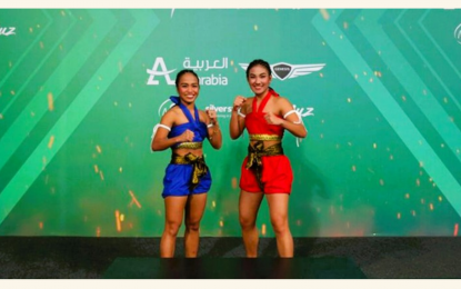 <p><strong>CHAMPIONS.</strong> Rhichien Yosorez (left) and Kylie Mallari won the mixed Mai Muay gold medal in the 2023 World Combat Games at the King Saud University Arena in Riyadh, Saudi Arabia on October 28, 2023. It was the second gold medal for Team Philippines after the victory of ju-jitsu fighter Kaila Jenna Napolis in the women's -52kg class. <em>(Photo courtesy of Muaythai Association of the Philippines)</em></p>