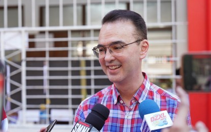 <p><strong>NO TO ABOLITION</strong>. Senator Alan Peter Cayetano entertains questions from the media on Monday (Oct. 30, 2023) after casting his vote for the Barangay and Sangguniang Kabataan Elections at a polling precinct inside Cipriano P. Sta. Teresa Elementary School in Taguig City. Cayetano dismissed calls to abolish the Sangguniang Kabataan saying youth leaders should be supported and mentored. <em>(Photo courtesy of the Office of Senator Alan Peter Cayetano) </em></p>