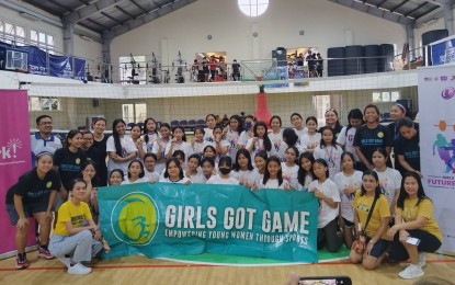 <p><strong>GIRLS GOT GAME.</strong> Young girls from Jose P. Laurel Senior High School in Quezon City pose for a group picture after a volleyball and training facilitated by volunteer-coaches from Girls Got Game on Oct. 14, 2023. The activity, which was organized by SPARK! Philippines, aims to boost young girls' confidence through sports. <em>(PNA photo by Ma. Teresa P. Montemayor)</em></p>