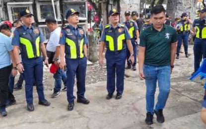 <p><strong>SECURING UNDAS.</strong> Police officials visit the San Nicolas Cemetery in Barangay Calamba in Cebu City on Tuesday (Oct. 31, 2023). The Philippine National Police in Central Visayas are now shifting gears from securing the Barangay and Sangguniang Kabataan Elections to securing cemeteries during Undas or All Saints’ and All Souls’ Days on Nov. 1 and 2. <em>(Contributed photo)</em></p>