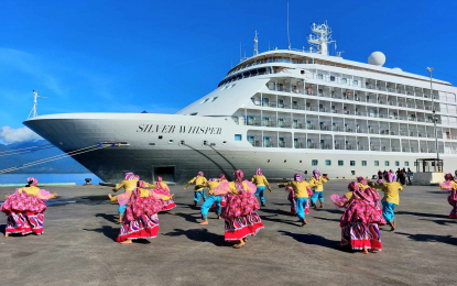 <p><strong>MS SILVER WHISPER</strong>. Folk dancers hired by the City Tourism Department welcome the passengers and crew of the luxury cruise ship as it arrives in Puerto Princesa on Thursday morning (Nov. 2, 2023). The ship's arrival is seen to herald a bigger tourism market for the city<em>. (Photo by Izza Reynoso)</em></p>