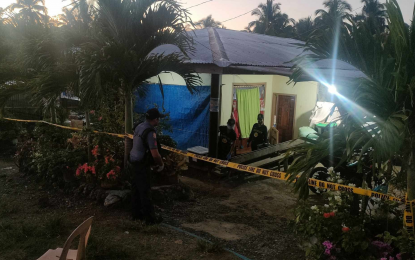 <p><strong>CRIME SCENE.</strong> The house of Mario and Carmelita Fabia in Barangay Kiorao, Kibawe, Bukidnon. The couple was killed on Oct. 30, 2023 by one of the suspects who ran in the polls but failed to capture a village council seat in the area. <em>(Photo courtesy of Kibawe Municipal Police Station)</em></p>