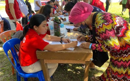 <p><strong>GOV’T FOR THE PEOPLE.</strong> Residents queue up for Department of Social Welfare and Development assistance at the “Bagong Pilipinas Serbisyo Fair” in Santa Cruz, Laguna on Saturday (Nov. 4, 2023). The agency, among the at least 50 government institutions in the weekend fair, provided financial assistance to 2,746 members of vulnerable sectors, including fisherfolk, farmers, and senior citizens; emergency cash assistance to 27 families affected by Severe Tropical Storm Paeng in October last year; seed capital assistance to three Sustainable Livelihood Program associations; and family food packs to at least 1,000 recipients. <em>(Photo courtesy of DSWD IV-A Facebook)</em></p>