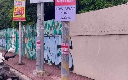 <p><strong>TOW-AWAY ZONE.</strong> Parking is prohibited at all times in certain areas along Lacson Street in Bacolod City. The city government has engaged the services of a private towing firm as the Bacolod Traffic Authority Office resumes the enforcement of the clamping and towing ordinance on Monday (Nov. 6, 2023). <em>(Photo courtesy of Bacolod Traffic Authority Office) </em></p>