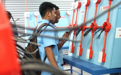 <p><strong>ELECTRIC LAB.</strong> Students from the J.V. Ferriols National High School in Davao City check the PHP1.3 million Electrical Installation and Maintenance (EIM) laboratory after it is turned over to the school on Monday (Nov. 6, 2023) by the AboitizPower subsidiary Davao Light and Power Co., Inc. (Davao Light). The initiative, called Project Electrical Lab, seeks to provide modern EIM laboratories for students to upgrade their skills and receive national certification. <em>(PNA photo by Robinson Niñal Jr.)</em></p>