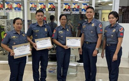 PRO-1 gives cash aid to cops affected by Typhoon Egay