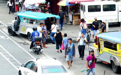 <p><strong>KING OF THE ROAD.</strong> Traditional jeepneys waiting for passengers at their temporary loading area in Fernando Poe Jr. Avenue in Muñoz, Quezon City on Tuesday (Nov. 7, 2023). The Land Transportation Franchising and Regulatory Board on Wednesday (Nov. 15, 2023) reminded operators of public utility vehicles to consolidate by Dec. 31 as it will be a requirement for vehicle registration next year. <em>(PNA photo by Ben Briones)</em></p>