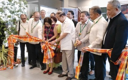 <p><strong>'COCANUT' CONGRESS.</strong> Senate Committee on Agriculture and Food chairperson Senator Cynthia Villar (third from left) and Agriculture Senior Undersecretary Domingo Panganiban (fourth from left) cut the ribbon to mark the opening of the exhibit as part of three-day National Coffee, Cacao, and Coconut (CoCaNut) Congress 2023, at the Iloilo Convention Center on Wednesday, (Nov. 8, 2023). Discussions during the event will include the global outlook for coffee, cacao and coconut industries, and government initiatives and financing schemes to boost the competitiveness of these local products. <em>(Photo courtesy of I Channel Multimedia Production)</em></p>