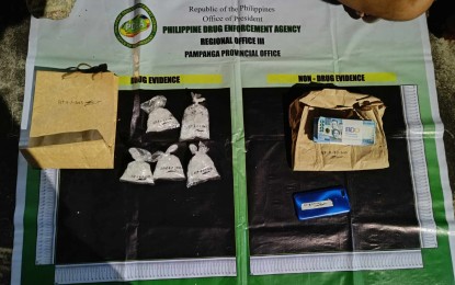 <p><strong>SEIZED</strong>. The confiscated shabu worth PHP3.4 million and other pieces of evidence seized in an operation conducted by agents of the Philippine Drug Enforcement Agency in Dasmariñas, Cavite on Tuesday (Nov. 7, 2023). The operation also led to the arrest of an alleged big-time drug dealer, who is reportedly involved in the bulk distribution of shabu in Pampanga, along with three other drug suspects<em>. (Photo courtesy of PDEA Region III)</em></p>