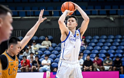 <p><strong>TOPSCORER.</strong> Ateneo de Manila University's Kai Ballungay aims for the basket against the University of Santo Tomas in the UAAP Season 86 men’s basketball tournament at the Smart Araneta Coliseum on Wednesday (Nov. 8, 2023). Ballungay had 15 points and 14 rebounds as the Eagles beat the Tigers, 67-59. <em>(Photo courtesy of UAAP)</em></p>