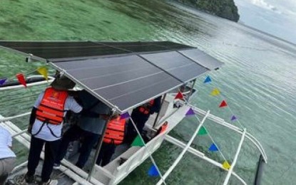 <p><strong>SOLAR-POWERED BOAT.</strong> A renewable energy-powered boat was christened and launched on Wednesday (Nov. 8, 2023) to answer the transportation needs of Coron town residents in Palawan. The boat, which roof consists of layers of solar panels, was funded by the United States Agency for International Development. <em>(Photo courtesy of USAID)</em></p>