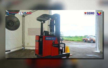 <p><strong>DONATION</strong>. A reach truck was among the equipment donated by World Food Programme to the Department of Social Welfare and Development-Eastern Visayas Field Office. The WFP delivered the disaster response equipment on Nov. 8, 2023 as the country commemorated the 10th anniversary of Super Typhoon Yolanda. <em>(Screengrab from DSWD video)</em></p>