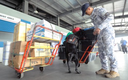 <p><strong>SAFETY FIRST. </strong>A Philippine Coast Guard (PCG) personnel inspects the North Port Passenger Terminal in Tondo, Manila on Oct. 27, 2023. The PCG will again intensify security operations in ports, harbors, and waterways during the holidays to ensure the safety of the public amid the expected influx of travelers. <em>(PNA photo by Yancy Lim) </em></p>