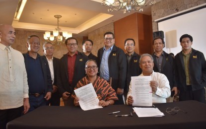 <p><strong>DEAL.</strong> Bureau of Corrections Director General Gregorio Catapang (seated, right) and Philippine College of Criminology president Ma. Angelica Bautista sign a memorandum of agreement at the BuCor in Muntilupa City on Friday (Nov. 10, 2023). The agreement aims to further improve the collaboration between BuCor and PCCR on academe development and career placement.<em> (Photo courtesy of BuCor)</em></p>