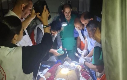 <p><strong>PRIMITIVE PROCEDURE.</strong>  Surgeons are performing procedures in darkened operating rooms, using flashlights to see. The Ministry of Health in Gaza has reported that 18 hospitals and 46 health centers are now non-operational due to the Israeli strikes. <em>(Anadolu)</em></p>