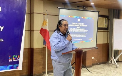 <p><strong>SAFE TRAVEL</strong>. Department of Tourism-Central Luzon Regional Director Richard Daenos delivers his message during the conduct of a series of seminar-orientations on disaster risk reduction and crisis management for the tourism industry in the City of San Fernando, Pampanga on Nov. 13-16, 2023. The move aims to equip tourism industry stakeholders with the necessary knowledge and skills on how to provide a safe and secure environment for tourists in Central Luzon.<em> (Photo courtesy of DOT-Central Luzon)</em></p>