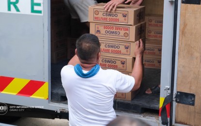 <p><strong>FLOOD ASSISTANCE.</strong> At least 9,000 relief goods have been distributed by the City Social Welfare and Development Office (CSWDO) to the 16 barangays affected by the November 8, 2023, urban and street flooding in Davao City. The CSWDO on Tuesday (Nov. 14) listed some 8,465 families with 19,037 dependents affected by the flooding.<em> (Photo from Davao City CIO)</em></p>