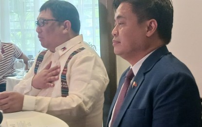 <p>Climate Change Commission Commissioner Albert dela Cruz (left)<em> (PNA photo by Ma. Teresa P. Montemayor)</em></p>