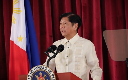 <p><strong>WORKING TRIP. </strong>President Ferdinand R. Marcos Jr. delivers his pre-departure statement at Villamor Air Base in Pasay City before flying to San Francisco, California, United States on Tuesday night (Nov. 14, 2023) to attend the 30th Asia-Pacific Economic Cooperation Summit. Marcos said he expects the signing of several agreements on the sidelines of the summit slated Nov. 15 to 17. <em>(PNA photo by Rey Baniquet)</em></p>
<p> </p>