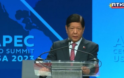 <p><strong>APEC CEO SUMMIT.</strong> President Ferdinand R. Marcos Jr. addresses his fellow world leaders and the global business community at the Asia-Pacific Economic Cooperation (APEC) CEO Summit in San Francisco, California on Thursday, Manila time (Nov. 16, 2023). This year's summit carries the theme "Creating Economic Opportunity" and features a lineup of dynamic and diverse speakers to shed light on sustainability, inclusion, resilience and innovation. <em>(Screenshot from Radio Television Malacañang)</em></p>