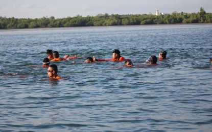 <p><strong>LONG SWIM</strong>. Philippine Coast Guard seamen undergo Water Search and Rescue training in this undated photo. On Wednesday (Nov. 15, 2023), a trainee drowned in Rizal, Palawan while undergoing the training course. <em>(Photo courtesy of PCG)</em></p>