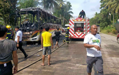 <p><strong>BURNT BUS.</strong> Firefighters put out the blaze that reduced a Mindanao Star Bus unit to ashes in Pigcawayan, North Cotabato on Saturday morning (Nov. 18, 2023). The driver, conductor, and all 20 passengers are unharmed. <em>(Photo courtesy of Pigcawayan MPS)</em></p>