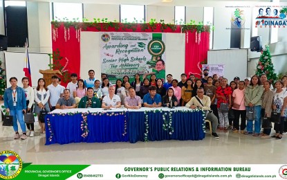 <p><strong>ACADEMIC EXCELLENCE</strong>. A total of 108 top-performing senior high school students receive cash incentives from the provincial government of Dinagat Islands on Friday (Nov. 17, 2023). Governor Nilo Demerey Jr. said the program also aims to motivate other students to work harder and strive for better performance. <em>(Photo courtesy of Dinagat Islands-PIO)</em></p>