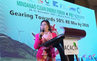 <p><strong>RENEWABLE ENERGY.</strong> Mindanao Development Authority Executive Director and Undersecretary Janet Lopoz speaks during the opening of the Mindanao Clean Energy Forum and Renewable Energy Congress in Davao City on Monday (Nov. 20, 2023). She said the island is on track to achieve its 50-percent renewable energy goals by harnessing renewables for energy and environmental sustainability.<em> (PNA photo by Robinson Niñal Jr.)</em></p>
