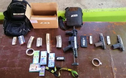 <p><strong>SEIZED.</strong> Illegal firearms and other evidence seized from three suspects, including an ex-village councilor, after their arrest during an entrapment in Cotabato City on Monday (Nov. 21, 2023). The suspects did not resist arrest when Criminal Investigation and Detection Group agents caught them. (<em>Photo courtesy of CIDG-BARMM)</em></p>