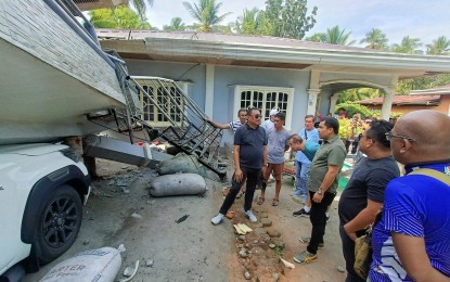 <p><strong>QUAKE DAMAGE.</strong> Sarangani Gov. Ruel Pacquiao (3rd from right) inspects a house in Malapatan, Sarangani on Sunday (Nov. 19, 2023), a couple of days after it collapsed during Friday’s magnitude 6.8 earthquake. Lawmakers on Monday (Nov. 20, 2023) filed House Resolution 1476 seeking an inquiry into the standard of public structures and public works in the wake of the powerful quake that struck southern Mindanao. <em>(Photo from Saranggani PIO Facebook page)</em></p>
