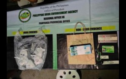 <p><strong>SEIZED.</strong> The pieces of evidence that include suspected shabu, with an estimated street value of PHP3.4 million confiscated from a couple after a buy-bust in Trece Martires, Cavite on Tuesday (Nov. 21, 2023). Charges of violation of Republic Act 9165 (Comprehensive Dangerous Drugs Act of 2002) will be filed against the arrested suspects. <em>(Photo courtesy of PDEA-3)</em></p>