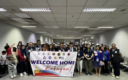 DMW welcomes OFWs from Israel, Lebanon