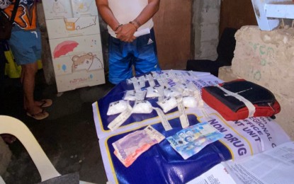 <p><strong>EVIDENCE.</strong> Operatives of Bacolod City Police Office City Drug Enforcement Unit arrest Marlon Coral Pango, a member of the Caunda Drug Group, in a buy-bust at his residence in Purok Pilipinhon, Barangay 30 on Thursday (Nov. 23, 2023). The suspect yielded 640 grams of shabu worth PHP4.352 million. <em>(Photo courtesy of Bacolod City Police Office) </em></p>
<p> </p>
