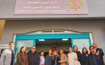 <p><strong>FLYING HOME.</strong> Philippine Embassy in Amman officers and personnel, led by Philippine Ambassador to Jordan Wilfredo Santos (third from left), with the five Filipinos who crossed the border in Jordan from the West Bank on Nov. 22, 2023. The Filipinos are scheduled to return to the Philippines Thursday (Nov. 23, 2023). <em>(Photo courtesy of Philippine Embassy in Amman)</em></p>