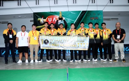 <p><strong>FOUR-PEAT.</strong> University of Santo Tomas men's team poses for a photo during the awarding ceremony of the UAAP Season 86 table tennis tournament at the Amoranto Sports Complex Arena in Quezon City on Thursday (Nov. 23, 2023). UST defeated Ateneo de Manila to claim its fourth straight title. <em>(Photo courtesy of UAAP)</em></p>