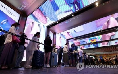 <p>Foreign tourists at a duty-free shop in Seoul, South Korea on Aug. 11, 2023.<em> (Yonhap) </em></p>
