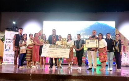 <p><strong>BEST TEAM</strong>. The Bagumbayan Coffee Village of Tabuk City, Kalinga beat 19 others in the search for the 2023 Best Cordillera Tourism Village competition of the Department of Tourism. The community took home PHP1 million during the awarding ceremony at Camp John Hay in Baguio City on Monday (Nov. 27, 2023), capping the three-day North Luzon Travel Expo. <em>(PNA photo by Liza T. Agoot)</em></p>