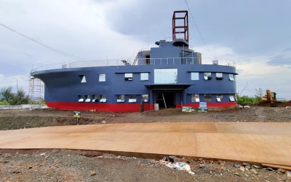 <p><strong>BATTLESHIP REPLICA.</strong> The building of the Office of the Governor of Dinagat Islands, which replicates Japan’s World War II Battleship Yamashiro, is set to open on Dec. 1, 2023. The PHP50-million building is a manifestation of gratitude to Japan, which provided support to the island province during the pandemic and the onslaught of Typhoon Odette in 2021.<em> (Photo courtesy of Janrelh Edera)</em></p>