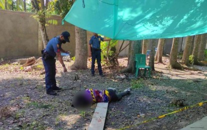 <p><strong>GUNNED DOWN.</strong> Police officers conduct a site investigation on the murder of a 21-year-old student inside the Datu Dalandag National High School compound in Pikit, North Cotabato, on Wednesday (Nov. 29, 2024). The victim was also a member of the Civilian Armed Forces Geographical Unit, according to the police. <em>(Photo courtesy of Pikit MPS)</em></p>