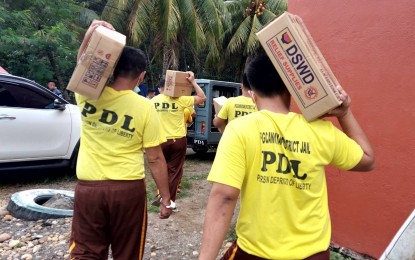 <p><strong>WALK TO FREEDOM.</strong> Seventy-five persons deprived of liberty (PDLs) are released during the rollout of the Enhanced Justice on Wheels 2023 in Kidapawan City, North Cotabato, on Thursday (Nov. 30, 2023). The PDLs also received financial and livelihood assistance from the provincial office of the Department of Social Welfare and Development. <em>(PNA photo by Robinson Niñal Jr.)</em></p>
