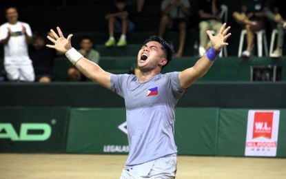 <p><strong>SHOUT FOR JOY.</strong> Second seed Alberto Lim Jr. celebrates after beating Hawaii-based Filipino Andre Ilagan, 6-2, 6-3, 6-4, in the men's singles final of the 40th Philippine Columbian Association Open in Paco, Manila on Sunday (Dec. 3, 2023). Lim pocketed PHP300,000 in cash. (<em>PNA photo by Avito C. Dalan)</em></p>