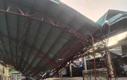 <p><strong>DOWN.</strong> The roof an open multipurpose court in Hinatuan, Surigao del Sur collapses following the magnitude 7.4 earthquake on Saturday night (Dec. 2, 2023). Aftershocks as strong as magnitude 6.2 were recorded early the following day. <em>(Photo courtesy of Hinatuan-LGU via PIA-Surigao del Sur)</em></p>