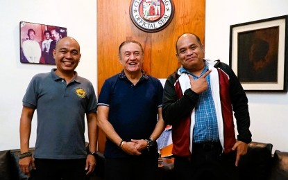 <p><strong>COURTESY CALL.</strong> Laoag City Mayor Michael Keon (center) welcomes Queen of the North chess tournament director Aldwin Galapon (left) and assistant tournament director International Master Ronald Bancod at his office in this undated photo. Laoag will host the tournament at the Ilocos Norte National High School Gymnasium on Dec. 17 to 23, 2023.<em> (Contributed photo)</em></p>